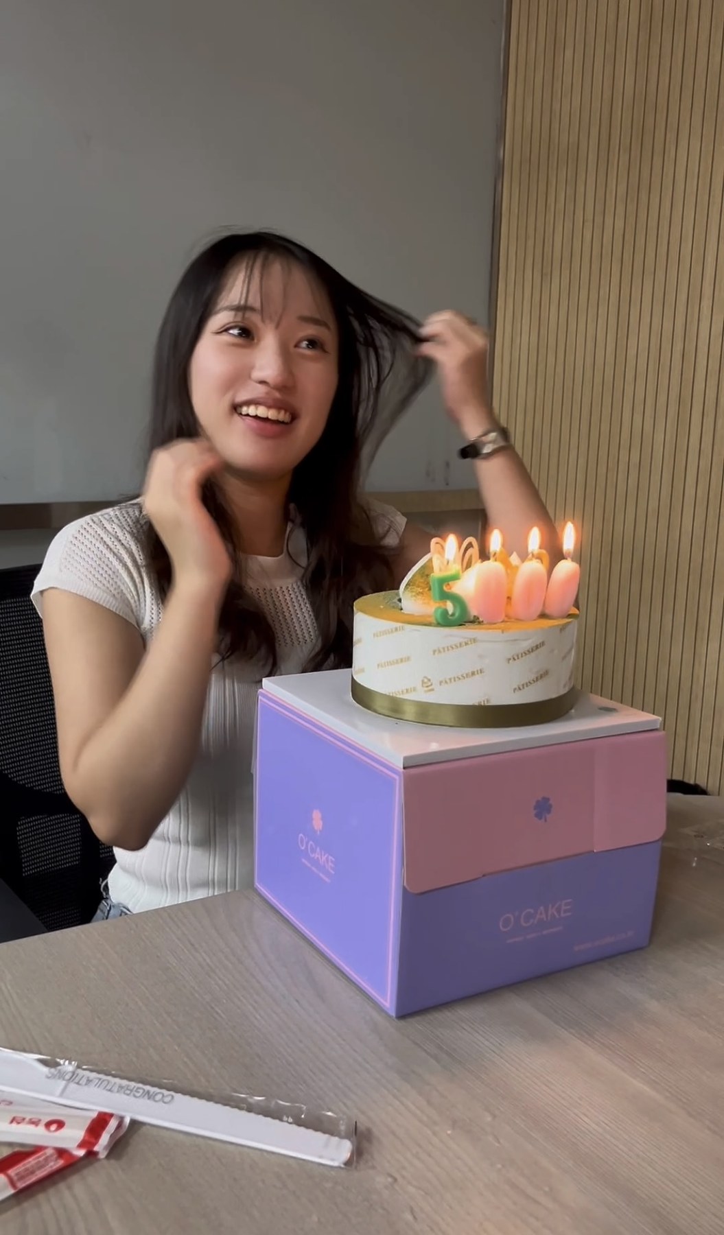 Yului Jeong celebrating 5,000 Instagram followers at a Team BDOT meeting